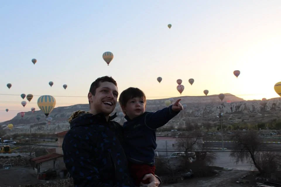 Wells and Daddy marveling at the balloons. 