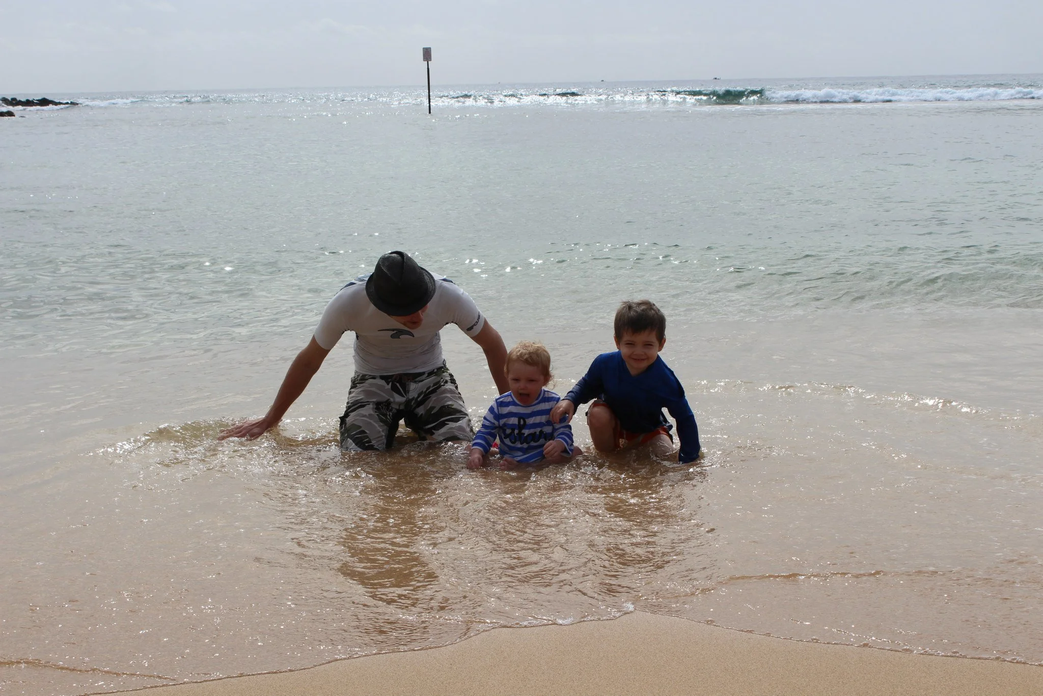 Playing in the water at Poipu Beach! 